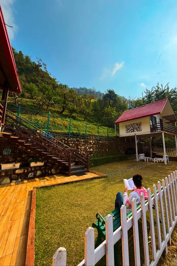 Lush private garden with the homestay exterior in background