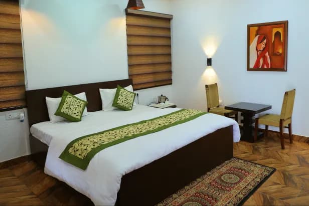 Elegantly furnished bedroom suite with valley-facing window