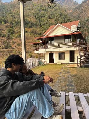 Guests relaxing at Madhuram Stays homestay